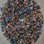 6K Eye Orange Colour Glossy Kundans