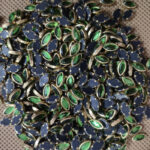 8K Eye Light Green Colour Glossy Kundans